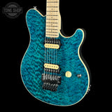 Front angle of Ernie Ball Music Man 30th Anniversary Axis Translucent Blue Quilt.