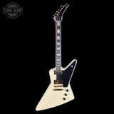 White electric guitar with black pickguard on a white background, featuring 'Tone Shop' logo.