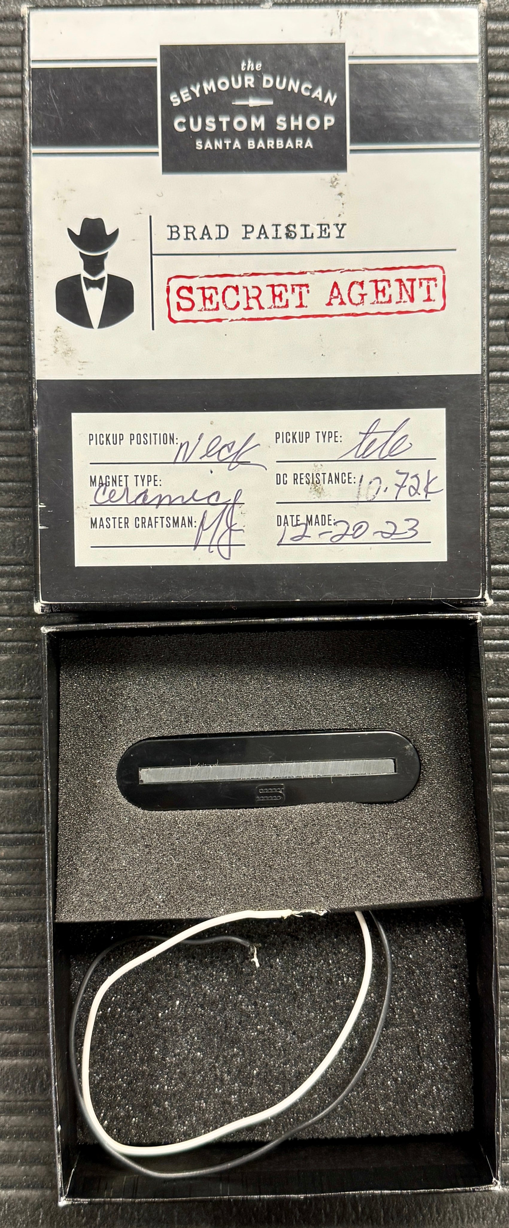 Music pickup with Seymour Duncan Custom Shop branding and 'Secret Agent' label.