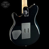 Back angle of Ernie Ball Music Man 30th Anniversary Axis Translucent Blue Quilt.