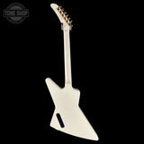White electric guitar on a black background with 'Tone Shop' logo.