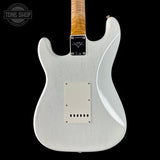White electric guitar with a visible brand logo on a black background