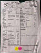 Document with text and a yellow sticker on a dark background