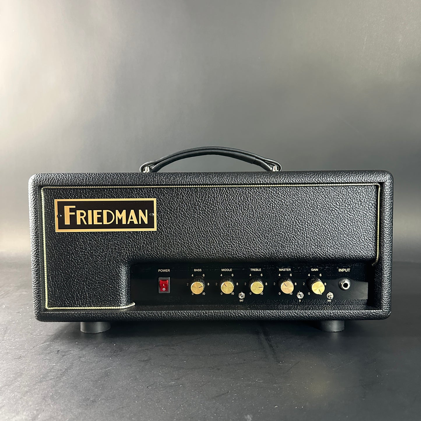 Friedman guitar amplifier head on a gray background