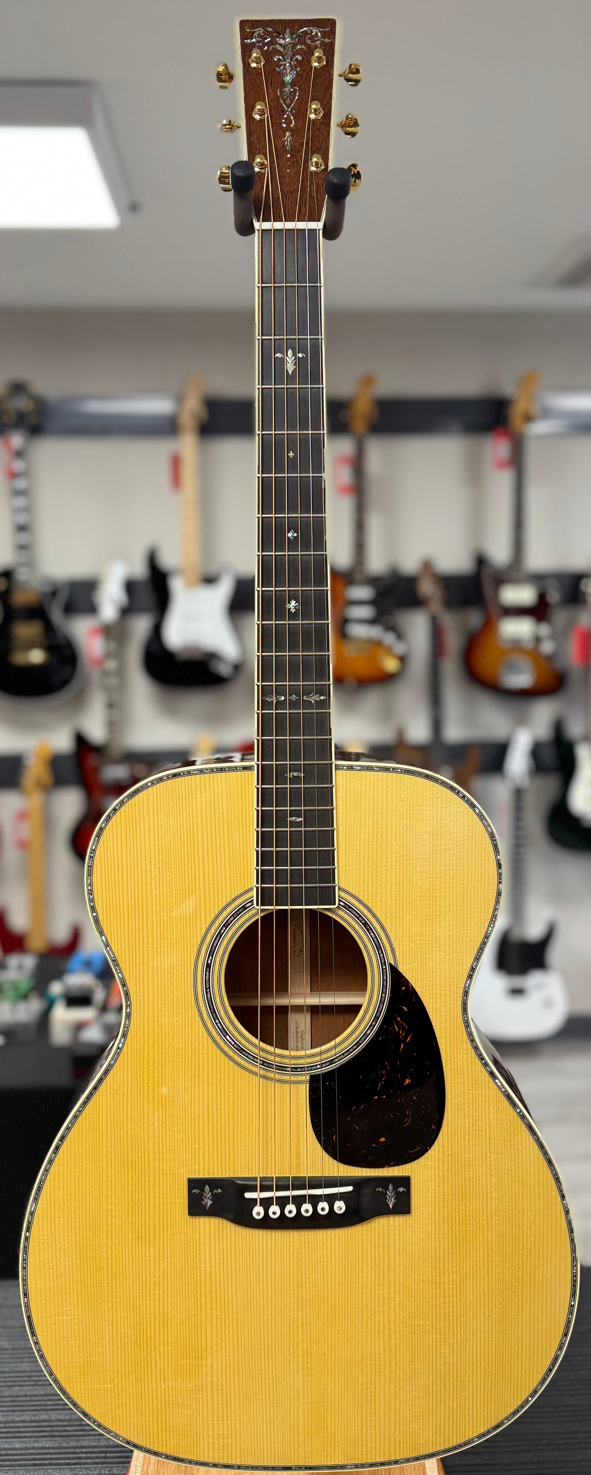 Front of whole Used Martin Custom Shop OM Adirondack/ Jaguar Claw Mahogany w/case TSS6167