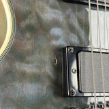 Ding on body of Used Epiphone Les Paul Custom Prophecy.