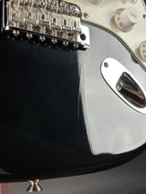 Finish checking below bridge of Used 2010 Fender Custom Shop 1960 Stratocaster NOS Black Matching Headstock.