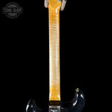 Guitar neck with a black background and 'Tone Shop' logo.