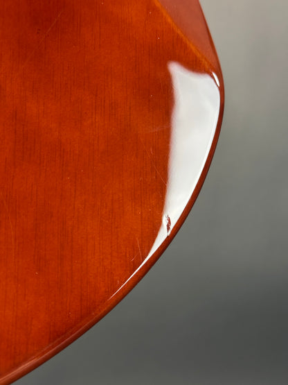 Close-up of a wooden surface with a gray background