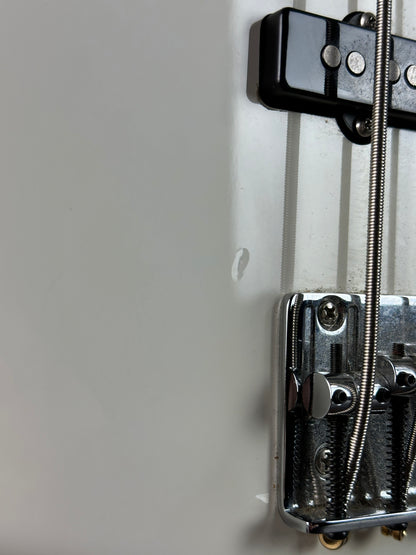 Close-up of a mechanical device with metal components on a light gray background