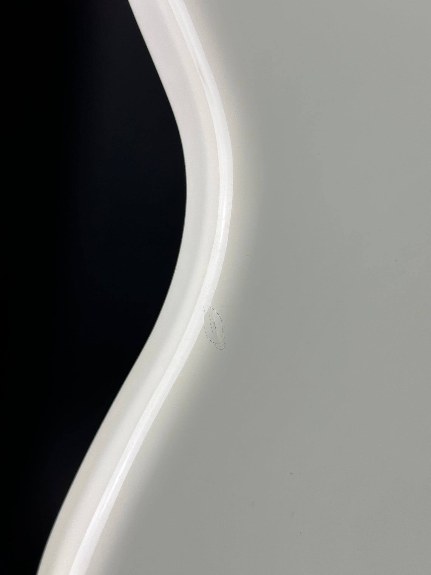 Ding on side of Used Fender Player Series Jazz Bass V White.