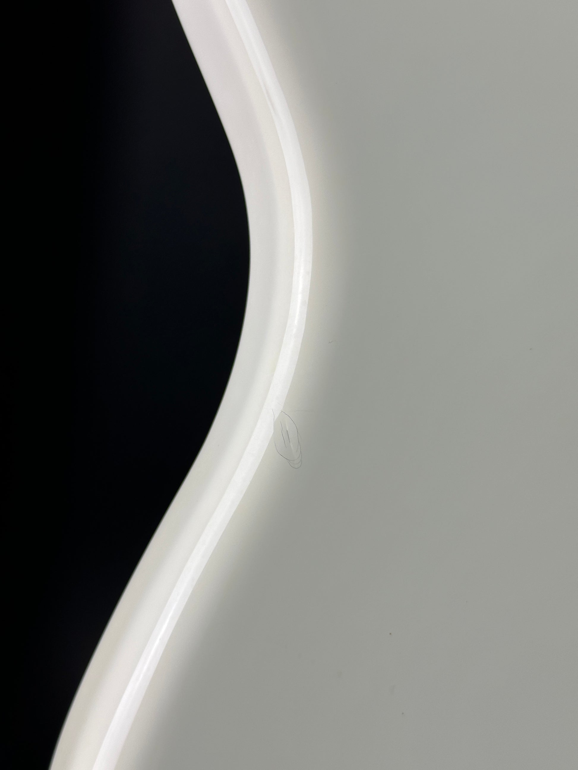 Ding on side of Used Fender Player Series Jazz Bass V White.