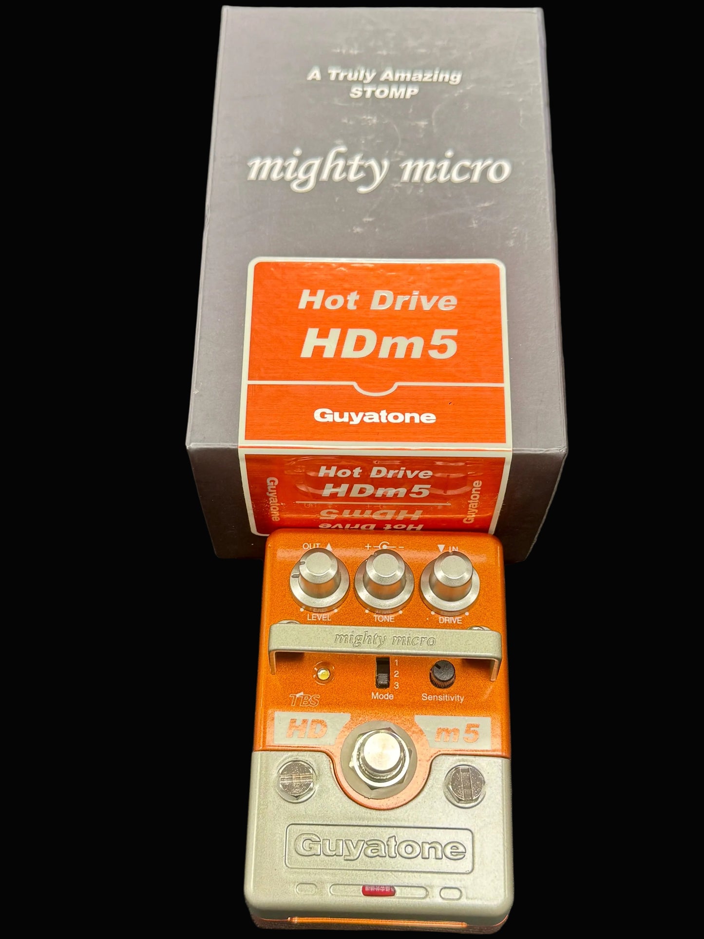 Gruvtone Hot Drive HDM5 pedal with packaging on a gray background