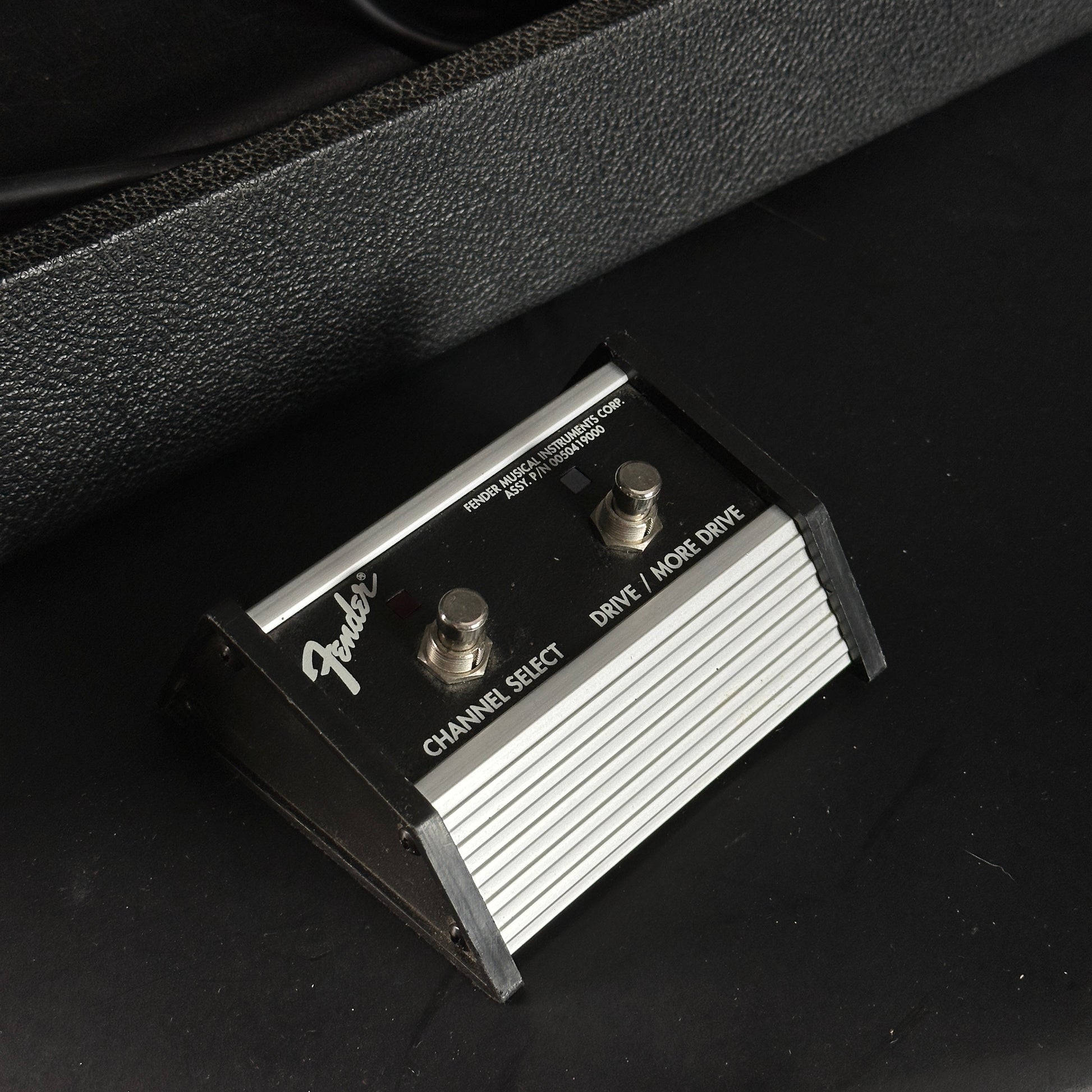 Fender guitar pedal on a black background