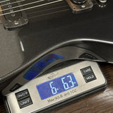 Powers Electric A-Type Graphite Metallic FF42 on scale displaying weight.