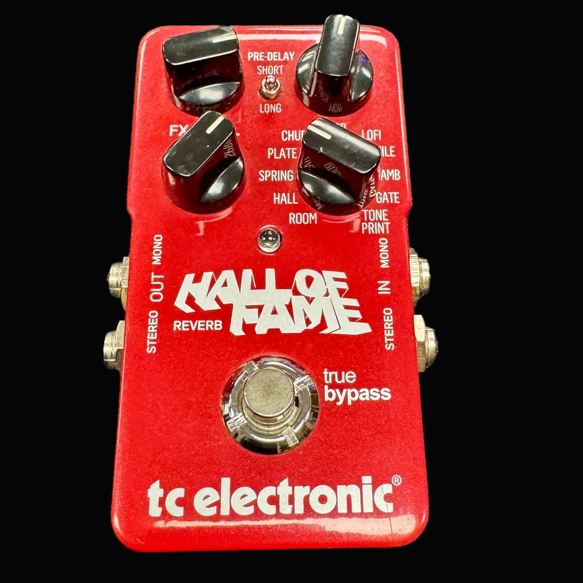 Red guitar effects pedal with 'Hall of Fame' and 'tc electronic' branding on a gray background