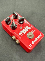 Red guitar effects pedal with 'Hall of Fame' and 'tc electronic' branding on a gray background