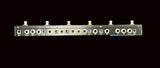 Audio patch panel with various connectors on a gray background