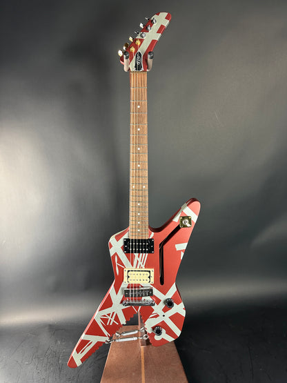 Electric guitar with a distinctive design on a dark background