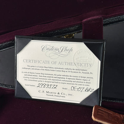Certificate of Authenticity for a C.F. Martin guitar on a dark background