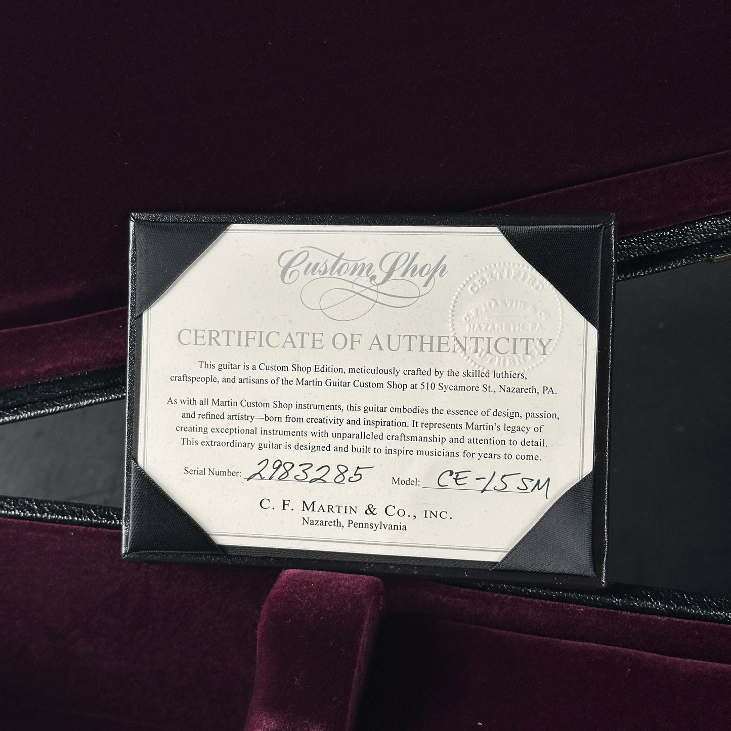 Certificate of Authenticity for a C.F. Martin guitar on a dark background