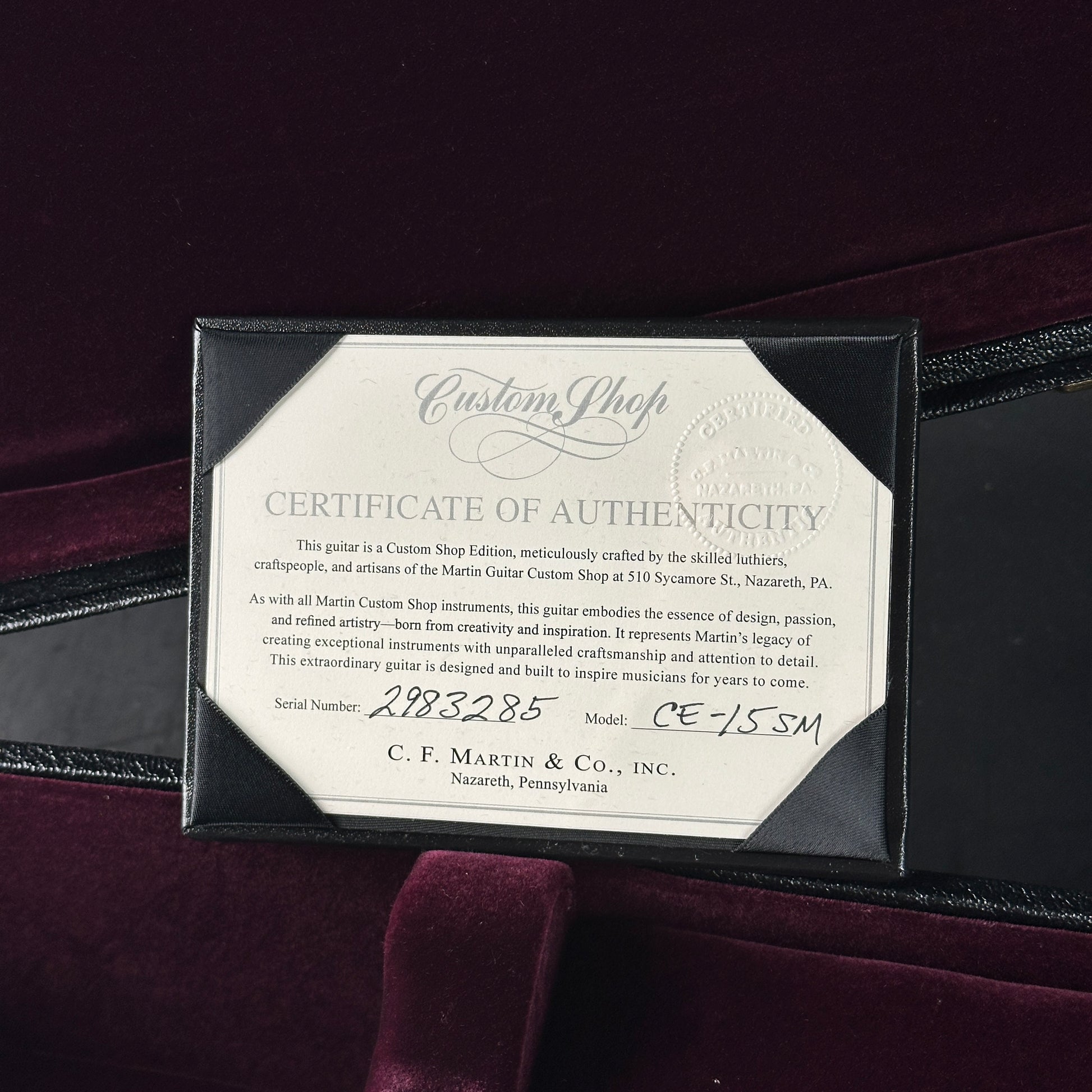 Certificate of Authenticity for a C.F. Martin guitar on a dark background