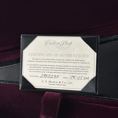 Certificate of Authenticity for a C.F. Martin guitar on a dark background
