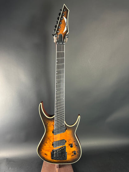 Electric guitar with a sunburst finish on a gray background