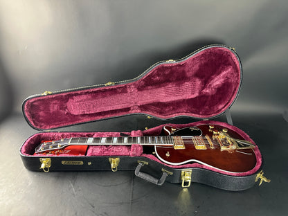 Used 2021 Gretsch G6228TG Walnut Stain in case.
