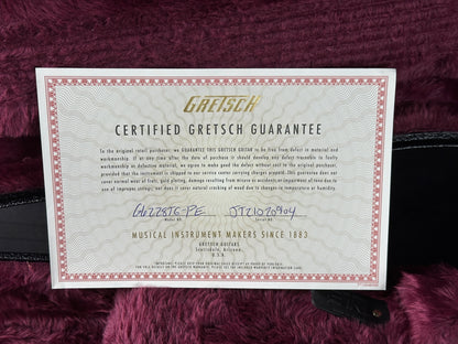 Gretsch Certified Gretsch Guarantee certificate on a maroon background