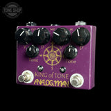 An Avlog Man 'King of Tone' guitar effects pedal in purple with black knobs and gold lettering, shown against a solid black background.