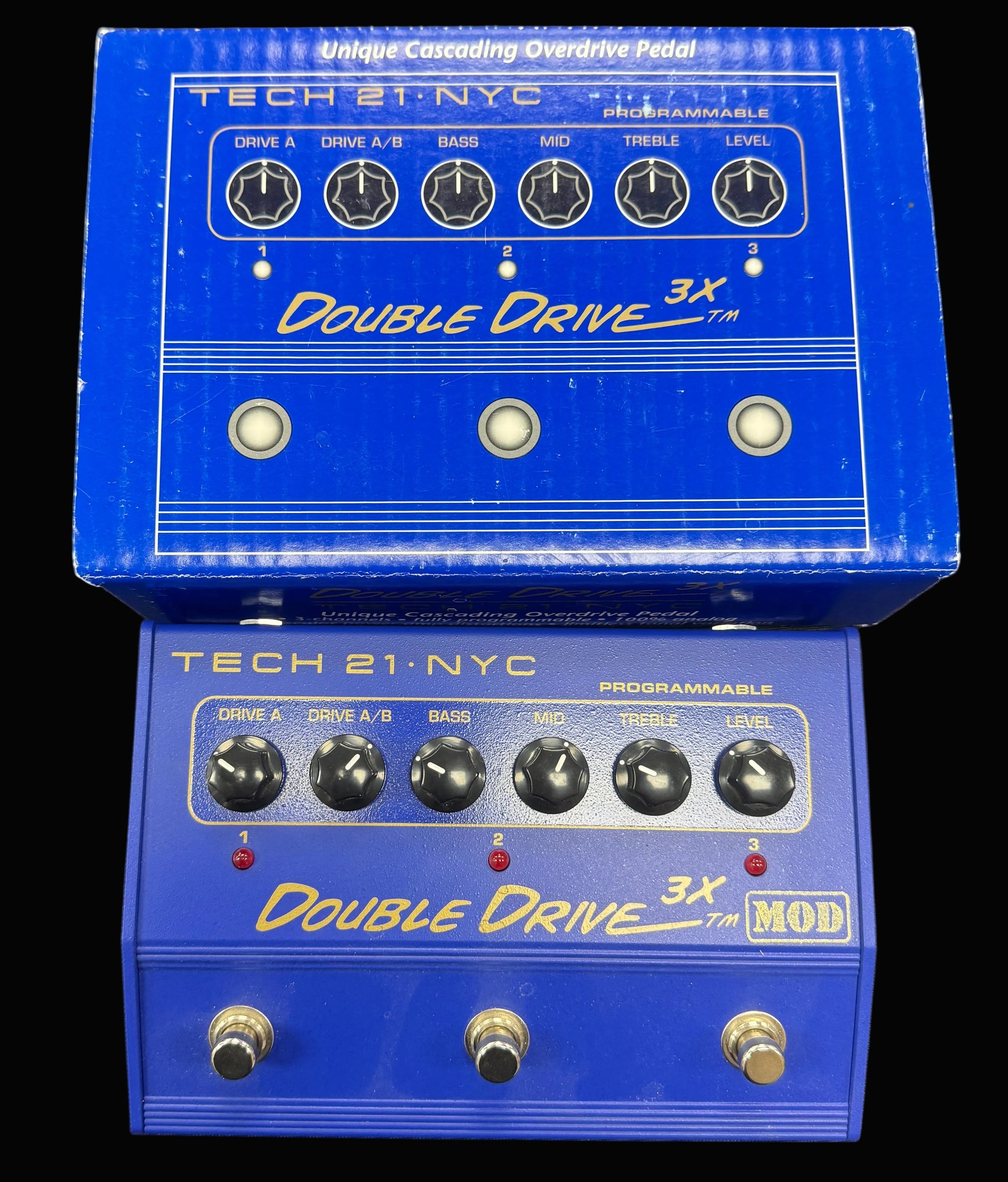 Blue guitar effects pedal with 'Tech 21 NYC' branding on a black background