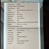 A printed specification sheet detailing the measurements and materials for a mahogany sinker, photographed against a dark background.