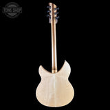 The back view of a natural wood electric guitar against a solid black background, featuring a light-colored maple body with visible wood grain and a matching neck.