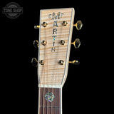 Headstock of Martin Custom Shop M/0000 42 Style Ambertone Adirondack/Pacific Big Leaf Flamed Maple.