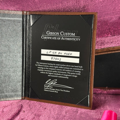 Gibson Custom Certificate of Authenticity on a pink background