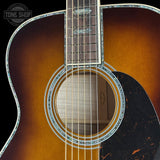 Soundhole of Martin Custom Shop M/0000 42 Style Ambertone Adirondack/Pacific Big Leaf Flamed Maple.