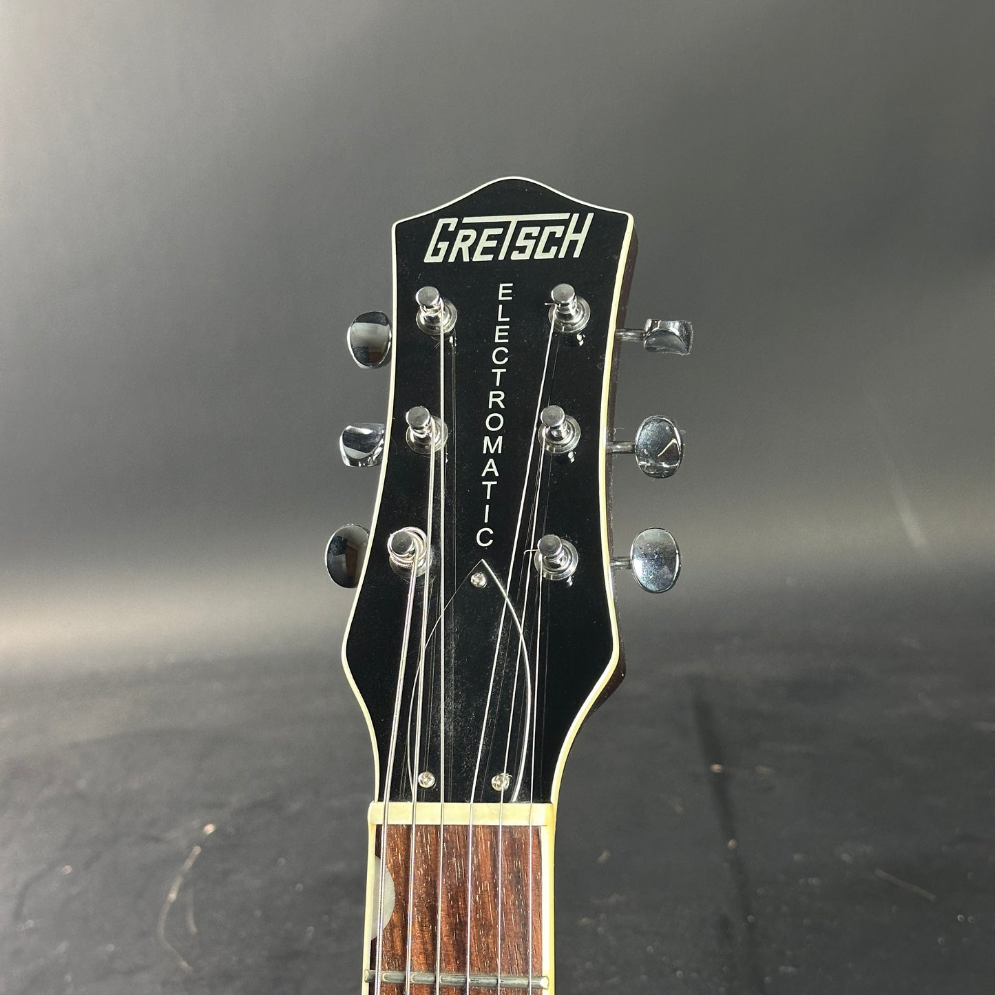 Headstock of Used Gretsch Electromatic Jet Black.