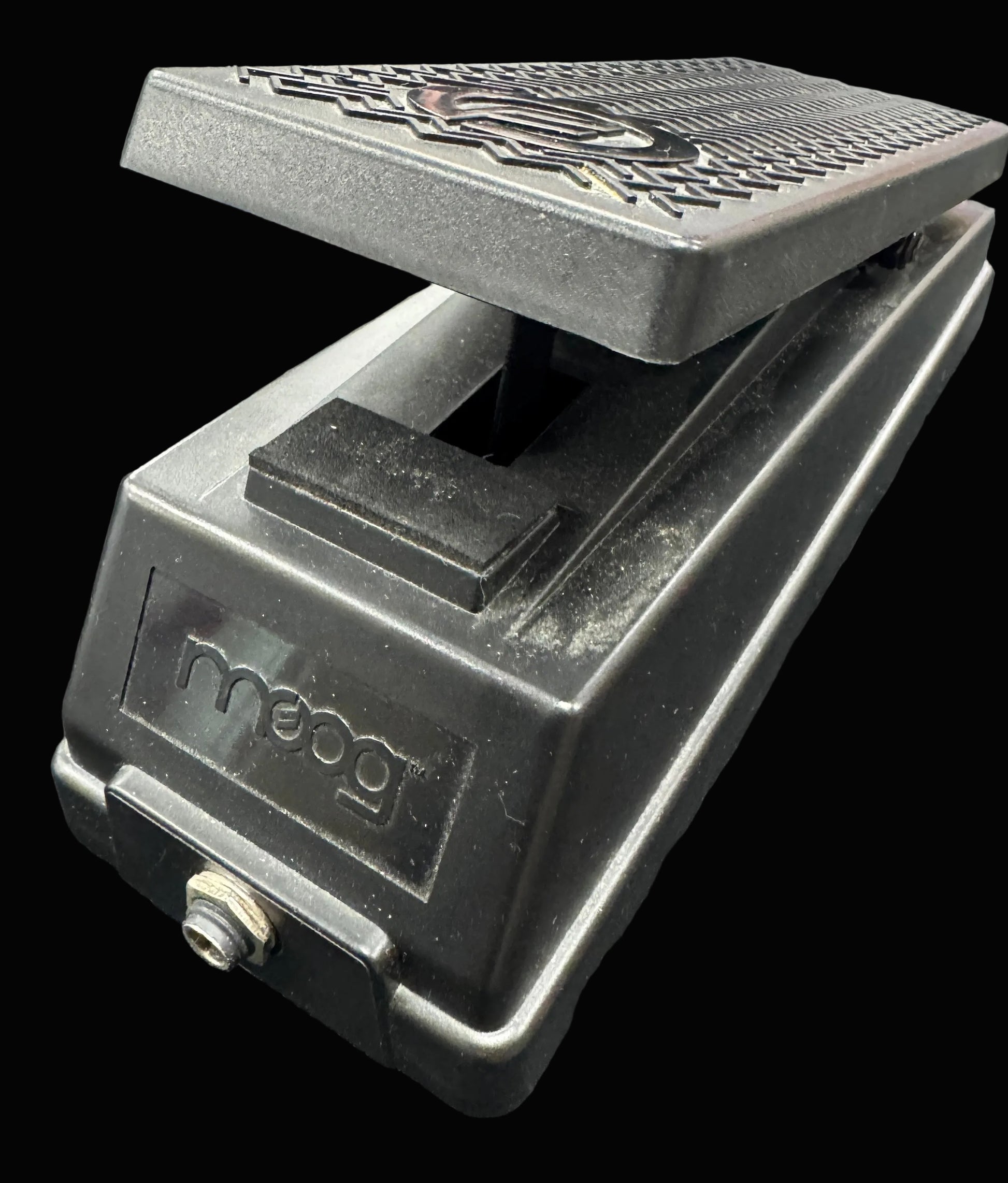 Moog guitar pedal on a gray background