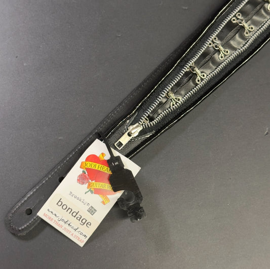 Detail of Jodi Head Bondage Rings Safety Pins Strap.