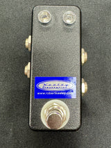 Guitar effects pedal with 'Robert Keeley Electronics' branding on a black background