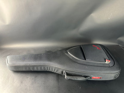 Guitar case with Fender logo on a metallic surface