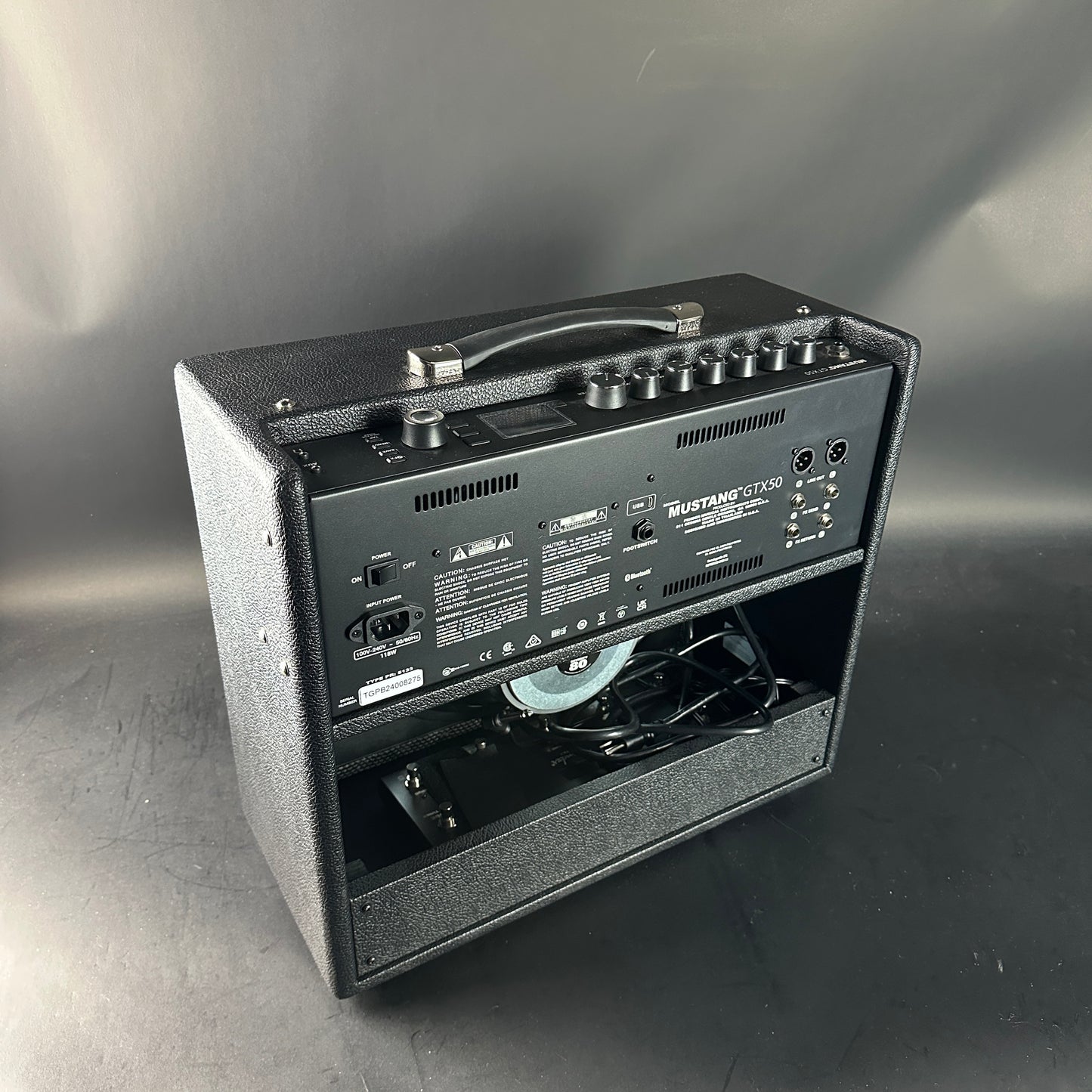 Guitar amplifier on a gray background
