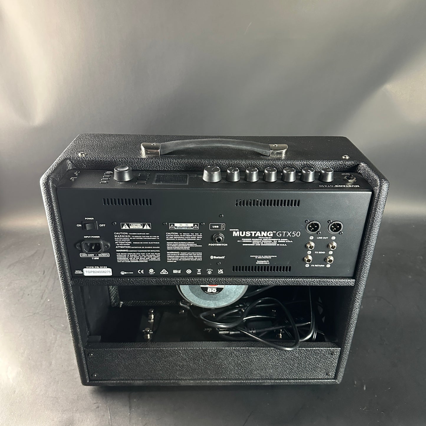 Guitar amplifier with 'Mustang GTX50' branding on a gray background