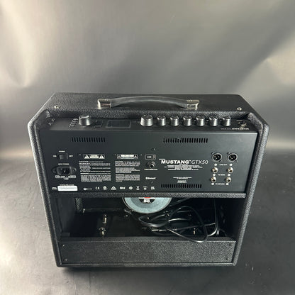 Guitar amplifier with 'Mustang GTX50' branding on a gray background