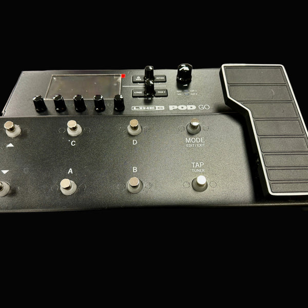 Line 6 Pod GO guitar effects processor on a dark surface