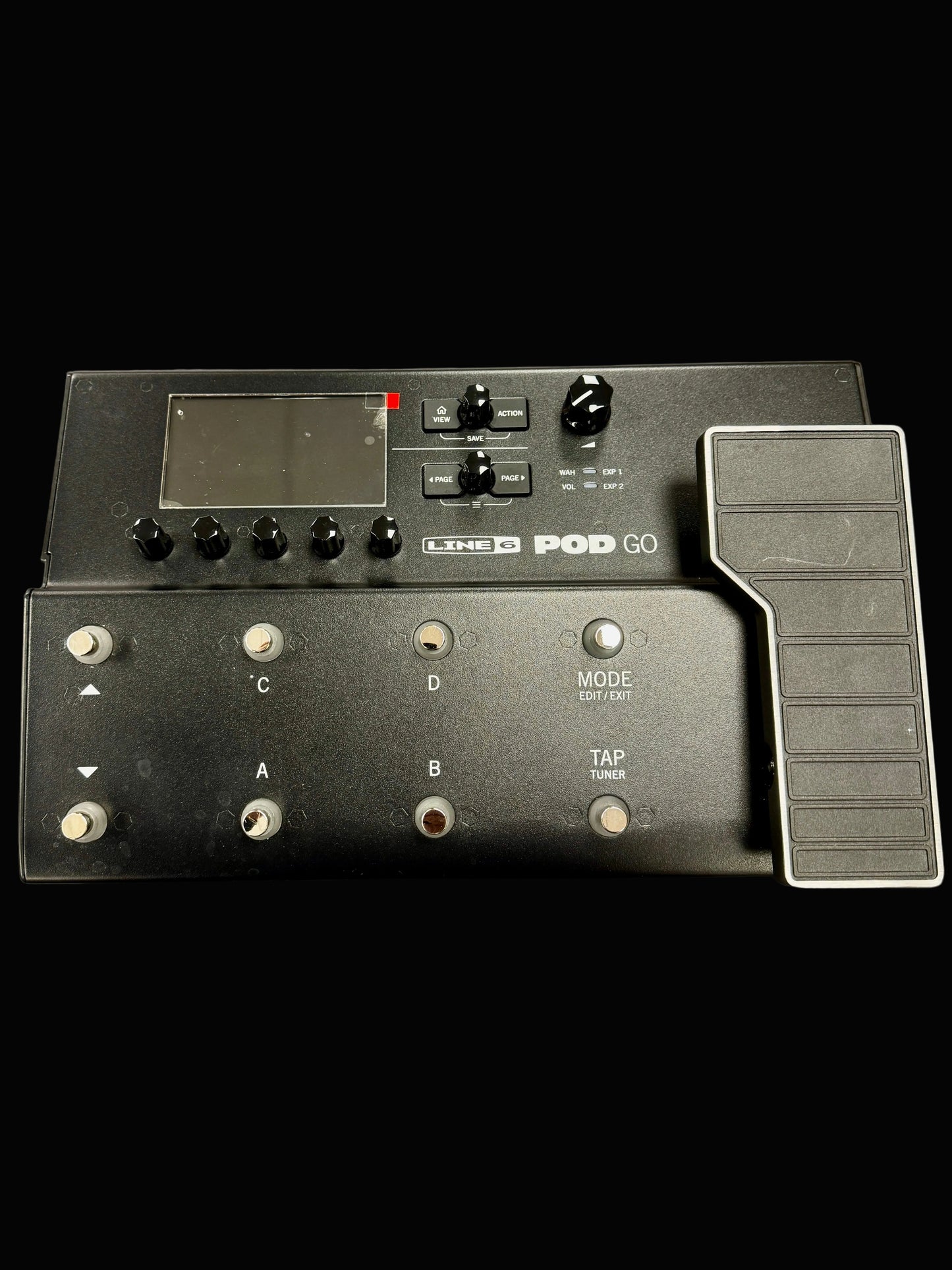 Black Line 6 Pod Go guitar effects processor on a gray surface