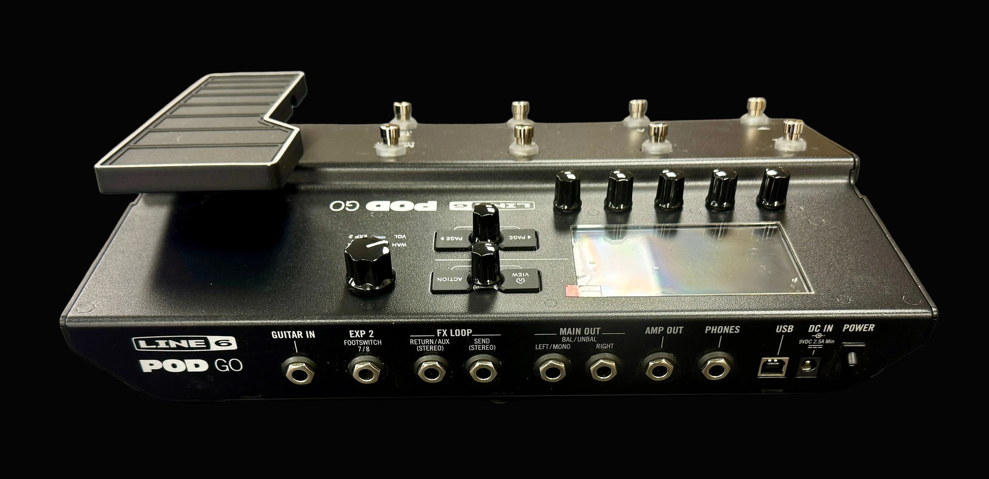 Line 6 Pod Go guitar effects processor on a dark surface