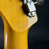 Wear on back of headstock of Used 2016 Squier Classic Vibe 60's Stratocaster Sunburst.