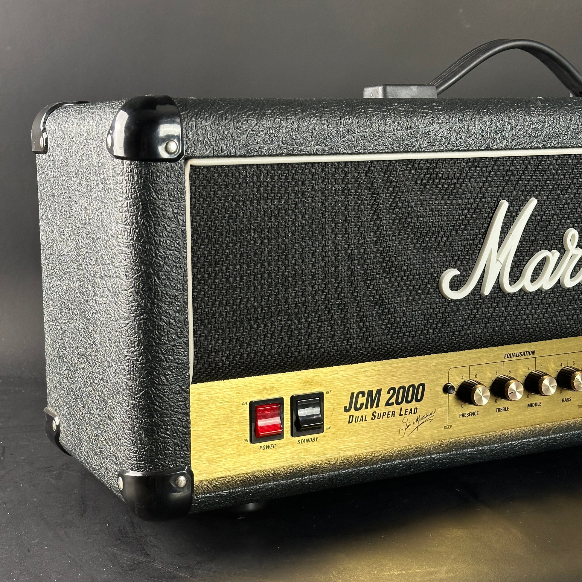 Marshall amplifier head with 'JCM 2000' and 'Dual Super Lead' on a dark background